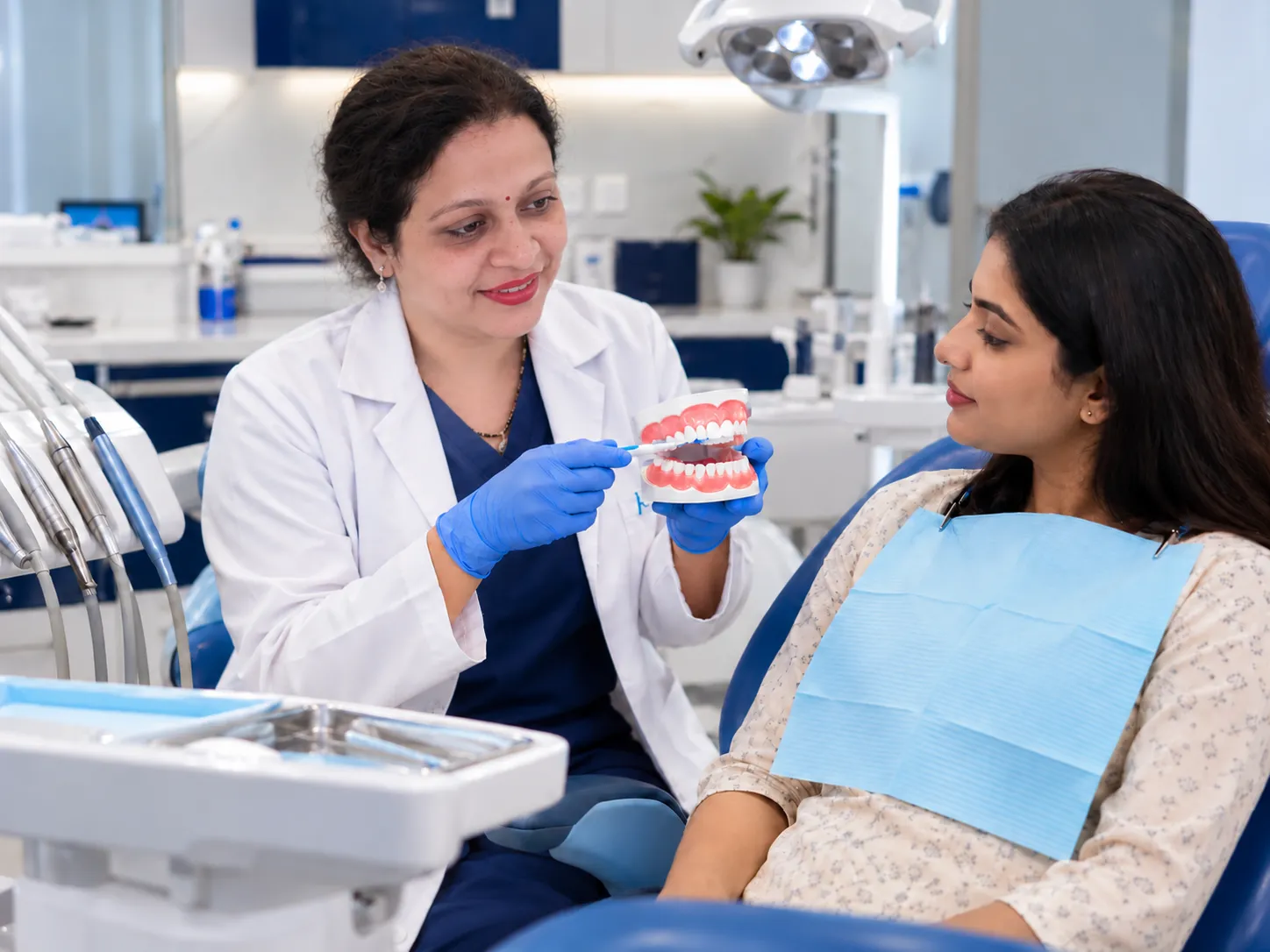 Dr. Kashmira Jathar providing preventive dental care during a dental examination